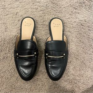Black leather loafers